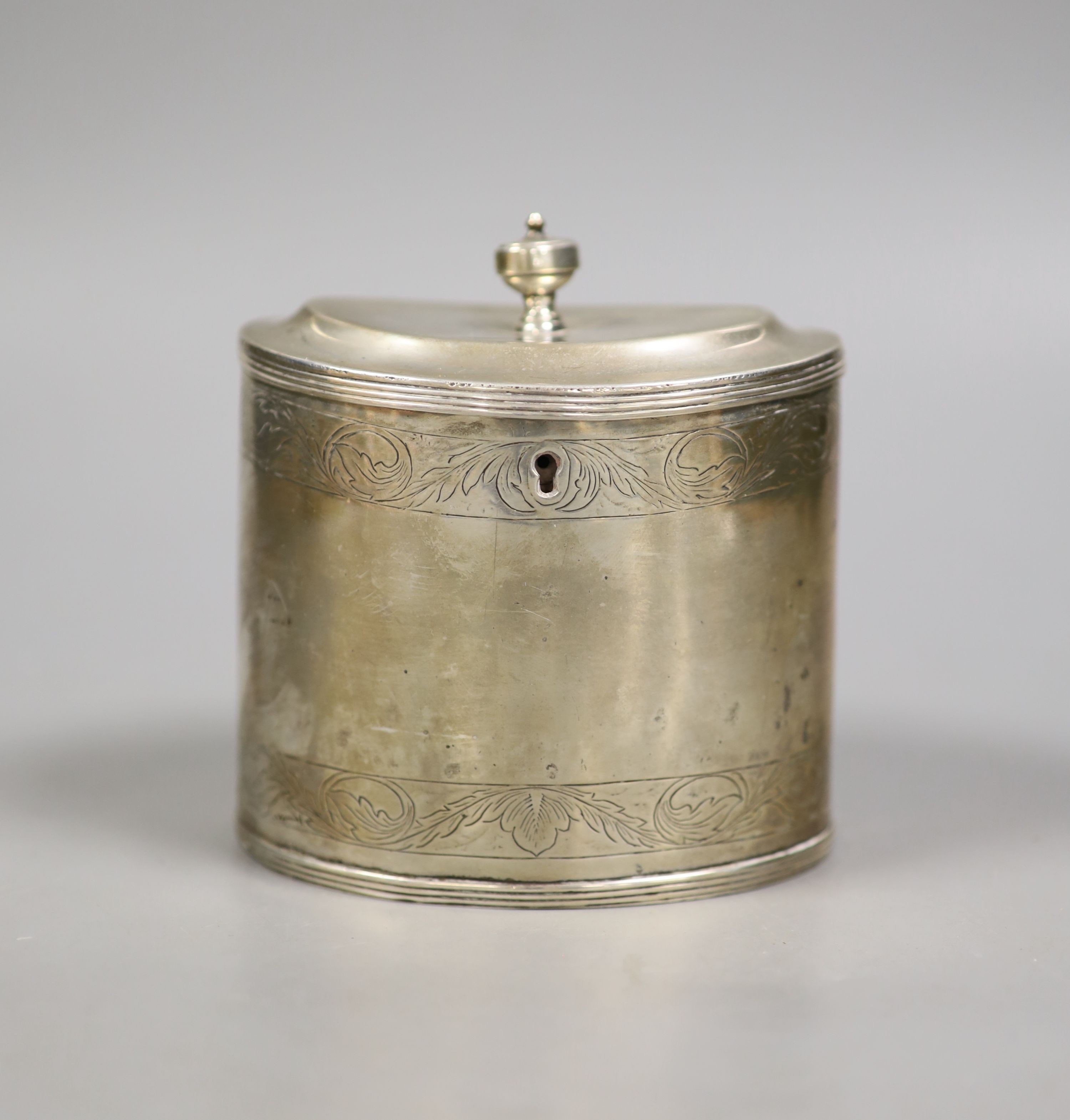 A 19th century Dutch white metal oval tea caddy, height 11.3cm, with lock, no key, 9oz.